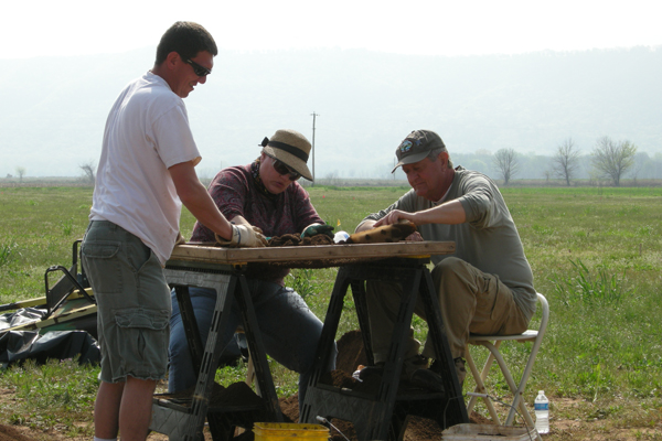 Aden Jenkins, Trona Wells, and Marion Haynes screening excavated sediments