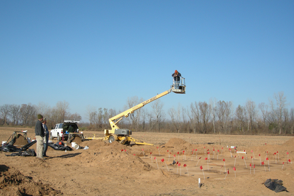 Photographing House 2 from lift boom