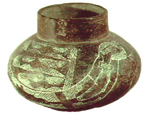 Pottery vessel decorated with Uktena image. Courtesy of University of Arkansas Museum