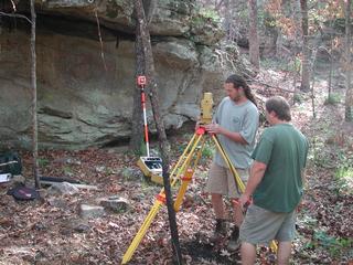 Mike Evans and Jared Pebworth set up a total station for mapping the site and surrounding terrain.