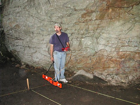 Figure 3. Jami Lockhart collecting electromagnetic conductivity and magnestic susceptibility data