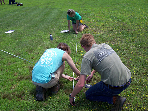 Participants at the Training Program learn STEM skills by putting archeological field methods into practice. Here they learn to lay out a grid using math and geometry. Participants at the Training Program learn STEM skills by putting archeological field methods into practice. Here they learn to lay out a grid using math and geometry.