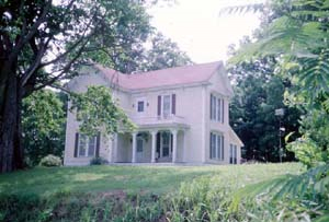 A daytime photograph of the D.N. Edmiston House in Cane Hill, Arkansas.