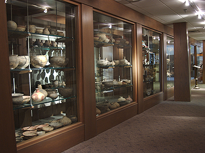 Photograph of the University of Arkansas Artifact Open Storage displays in the Arkansas Archeological Survey building in Fayetteville