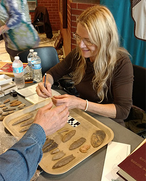 ASU station archeologist Dr. Juliet Morrow identifies artifacts at Parkin Archeological State Park.