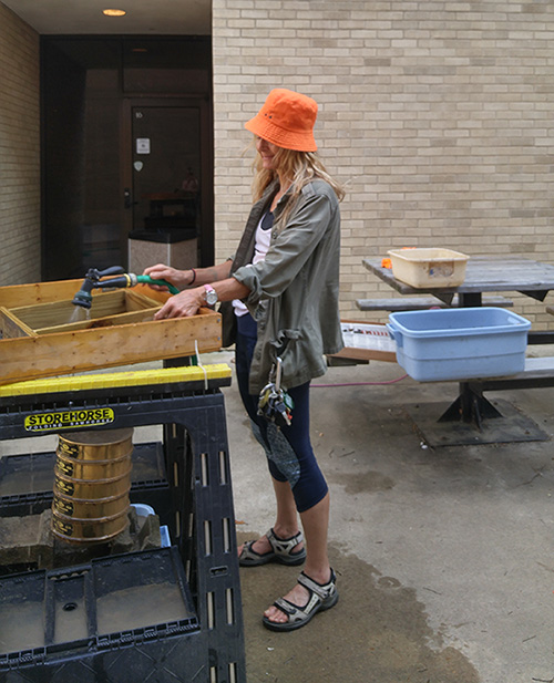 ASU station archeologist Julie Morrow processing a soil sample from 3CT11/22 (Area 6).