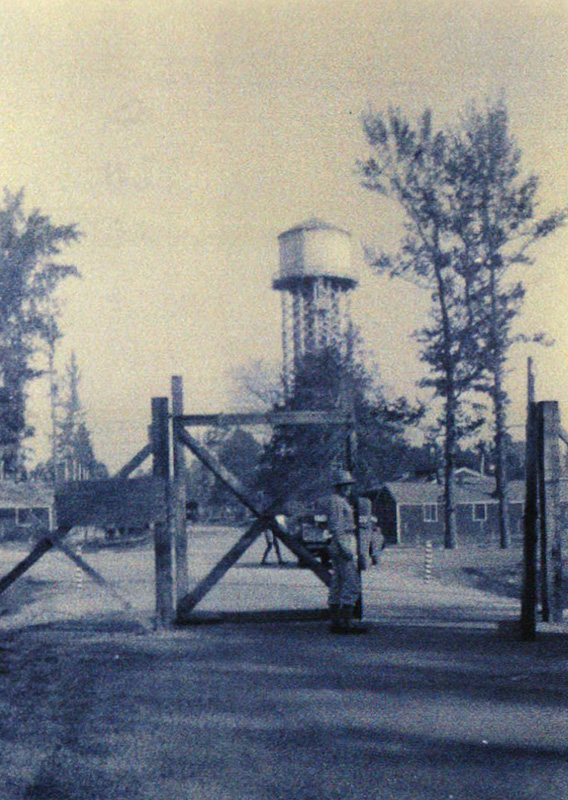 Entrance to the Officer’s Compound at Camp Monticello with the water tower in the background (photograph courtesy of Pat Globes Carter).