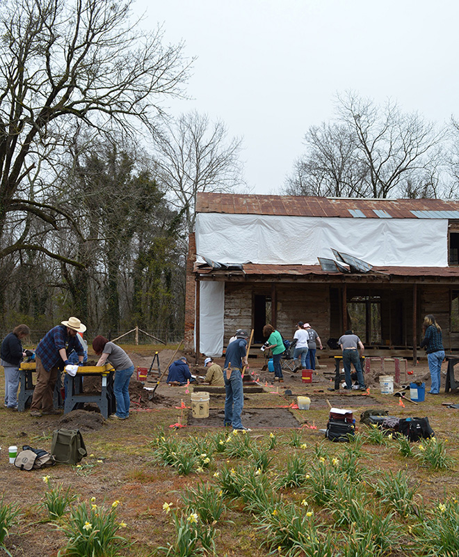 Archeologists and volunteers excavating the ell kitchen spring 2014.