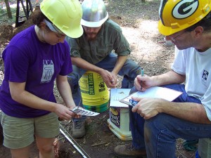 Field crewmembers documenting soil colors at the 2013 Society Training Program. 
