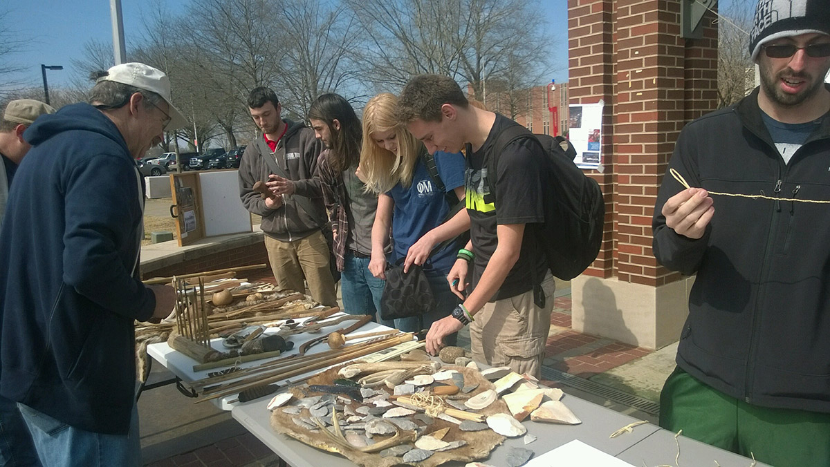 Arkansas Tech University students examine artifact replicas at Archeology Day 2016 in Russellville. The event was hosted by ARAS-WRI station archeologist Dr. Emily Beahm and the Arkansas Tech Anthropology Club.