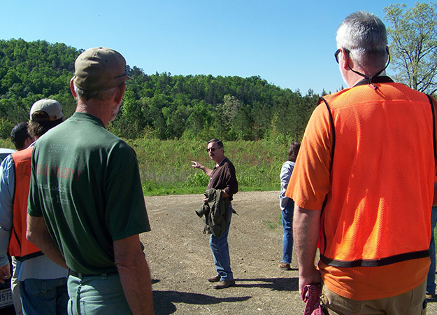 Roger Coleman (Ouachita National Forest) gives background to the team prior to the quarry hike.