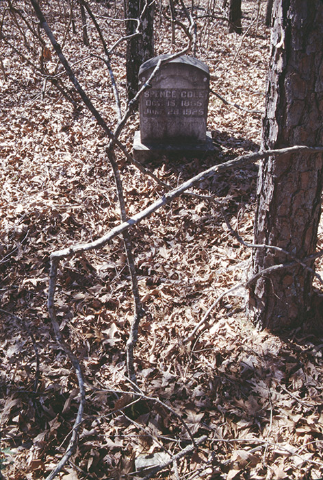 The gravestone of Spence Cole reads “Gone but not forgotten.” This cemetery in Hot Spring County has now been recorded as archeological site 3HS608. 
