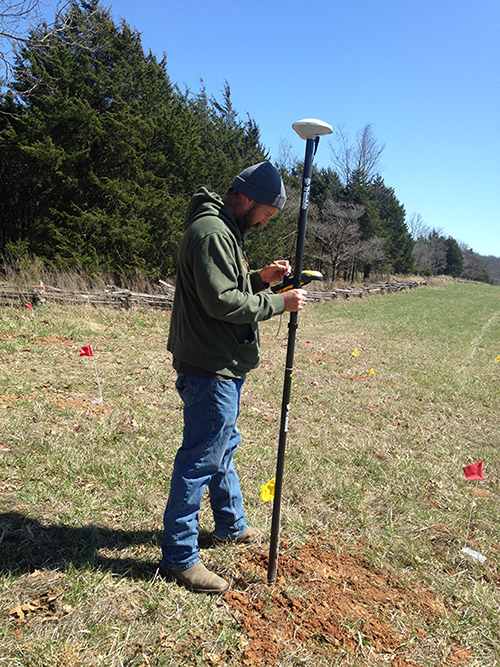 Michael Evans (ARAS-SRP) during geophysical survey at Pea Ridge National Military Park as part of the CESU project in cooperation with the National Park Service Midwest Archeological Center. Photo: Jamie Brandon.