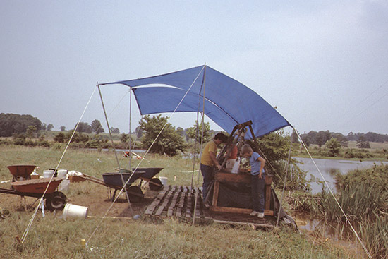 Water screening at Holman Springs during the 1986 Society dig.