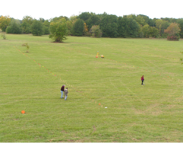 ARAS/OAS team conducting a gradiometer survey at Spiro.