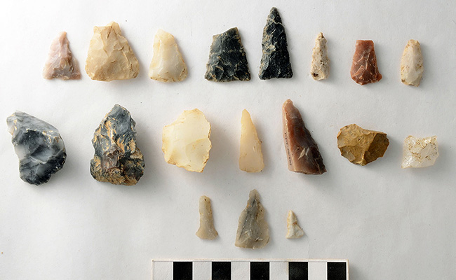 Chipped stone artifacts from 3SA11 included bifacially-chipped pieces of novaculite, chert, and quartz. Thin triangular point preforms and small bifacial drills were identified at both sites.