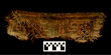 Woven basket lid (University of Arkansas Museum Collections).