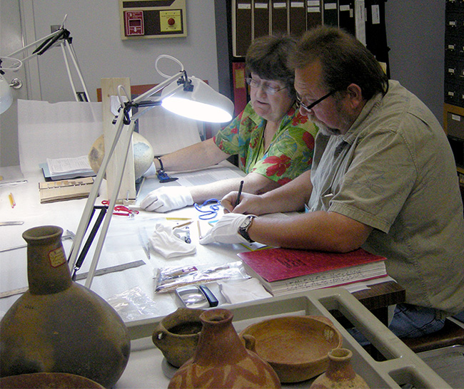 Robert Cast (Caddo Nation THPO) and Dr. Ann Early (Arkansas State Archeologist) documenting Arkansas pottery collections at the Gilcrease Museum in Tulsa.