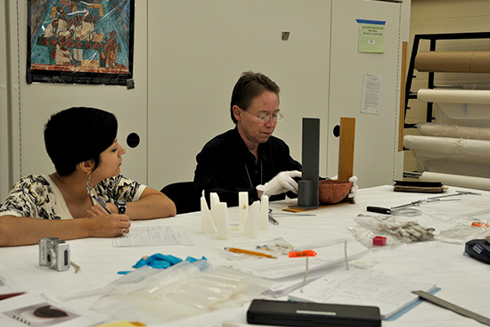 June Carpenter (Osage Nation Historic Preservation Program) and Dr. Andrea Hunter (Osage Nation THPO) documenting Arkansas pottery collections at the National Museum of the American Indian collection facility in Suitland, MD.