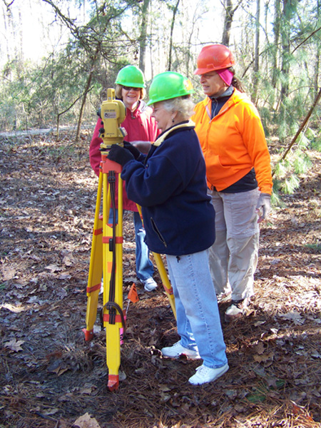Members of the Ouachita Chapter learned to use a total station while mapping a site.