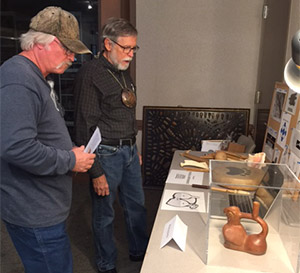 Jim Rees shares information on prehistoric musical instruments at the University of Arkansas curation facility in Fayetteville. . Photo by Marilyn Knapp.