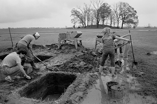 Early excavations at Toltec Mounds. Dr. Martha Rolingson is pictured on the left.