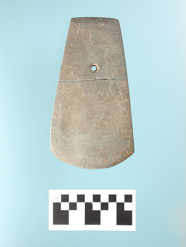 Perforated celt from Prairie County, obverse face.