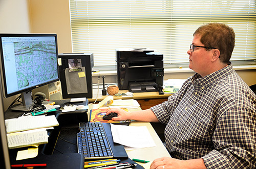 Registrar Teka McGlothlin entering project data into AMASDA. Registrar Teka McGlothlin entering project data into AMASDA.