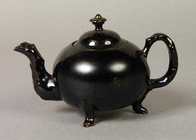 This photograph shows what the whole Davidsonville Jackfield teapot might have looked like (Shrewsbury, England Museum Services Image sy1714). Part of a lid and a finial were also found. 