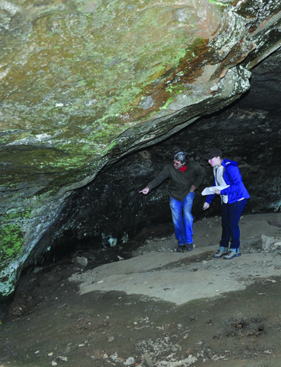 Jerry Hilliard at The Narrows rock art site with Environmental Dynamics Program Ph.D. student Kaelin Groom Jerry Hilliard at The Narrows rock art site with Environmental Dynamics Program Ph.D. student Kaelin Groom