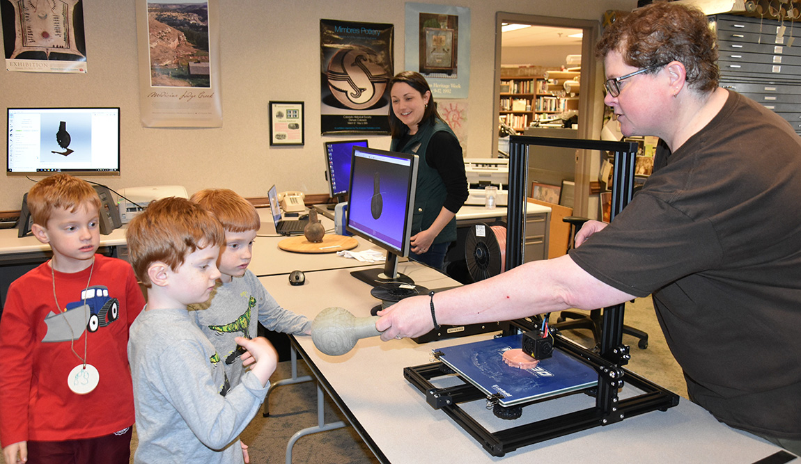 Sarah Shepard and Teka McGlothlin talk to visitors about 3D technology during Celebrate Archeology Day 2019. Photo by Rachel Tebbetts.