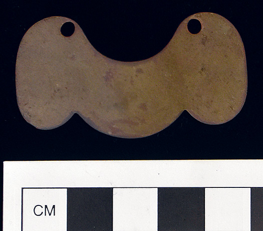 Small brass plate, segment from a set of shoulder scales, found at Pea Ridge National Military Park during fieldwork in 2018. Acc. No. 2018-438, FSN 605