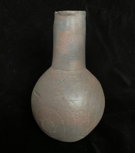 Engraved ceramic bottle replica from the Ouachita Mountains (UA Museum Collection).