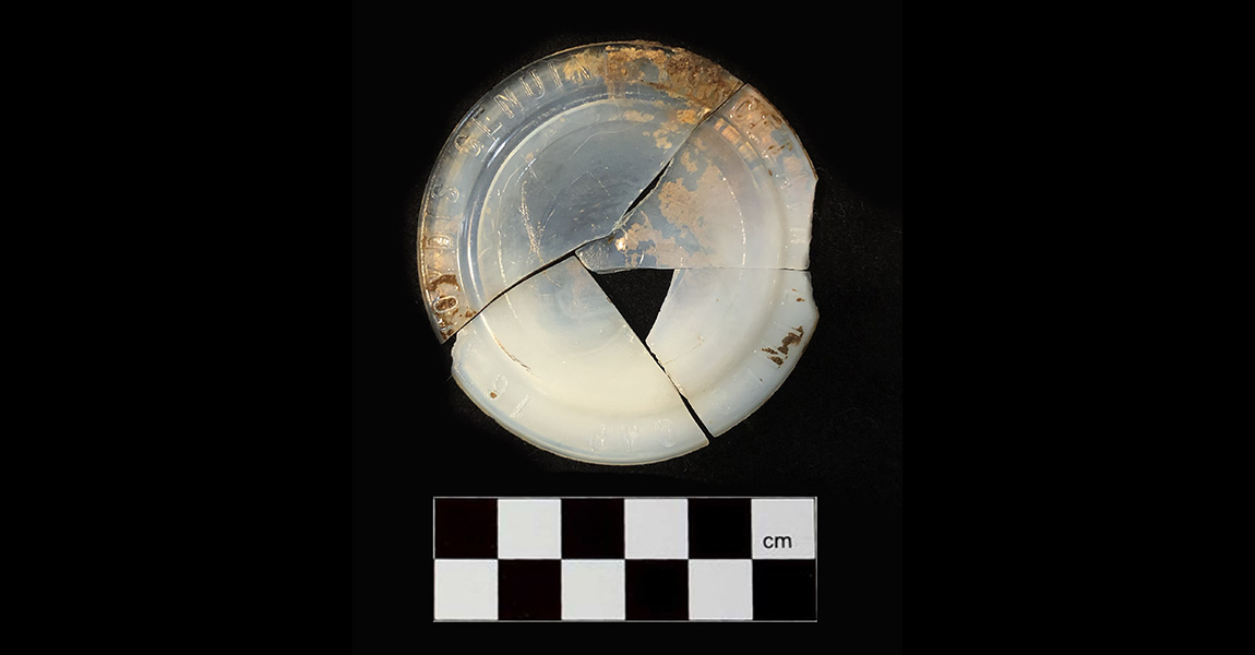 Figure 1. Photo of the four fragments of a Boyd’s Genuine Porcelain Cap Liner (canning jar lid). Photo Credit: Andrew Beaupré