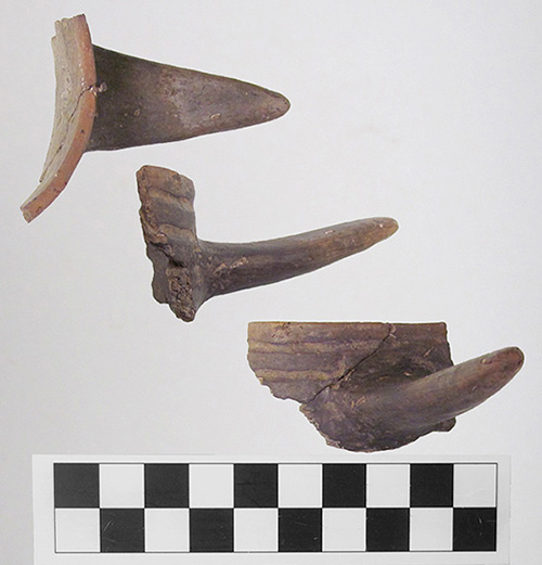 Three views of the beaker handle fragment