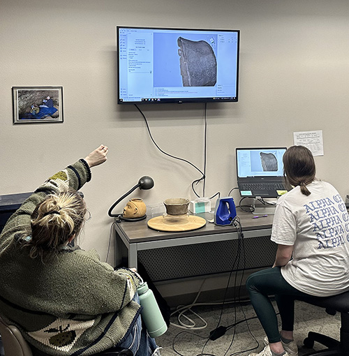 Photo of 2 women working in the 3D Imaging Lab at the Arkansas Archeological Survey